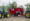 Jaylor-5850HD-twin-auger-trailer-being-loaded-with-hay | Jaylor Jaylor 5850HD being loaded with a large round bale to be loaded to be mixed into a TMR ration for a beef cattle farm.