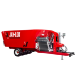 6600 | Jaylor Red Jay-Lor mixer wagon for livestock feed with hitch, wheels, and control panel on the front.
